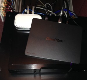 DVR+ lying on top of the stuff on my top shelf